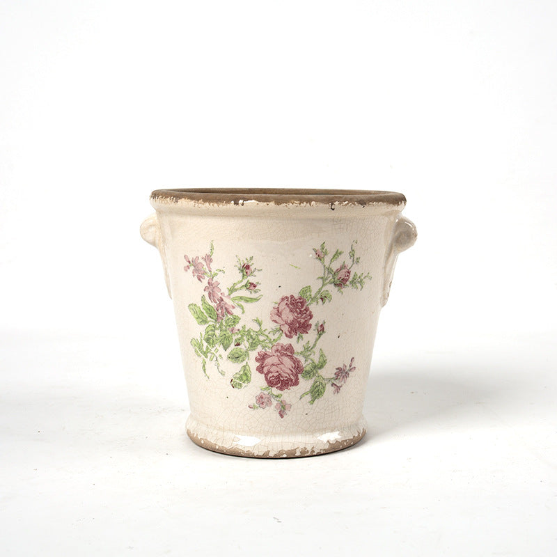 Decorative flower pot with floral embellishments Stornfield