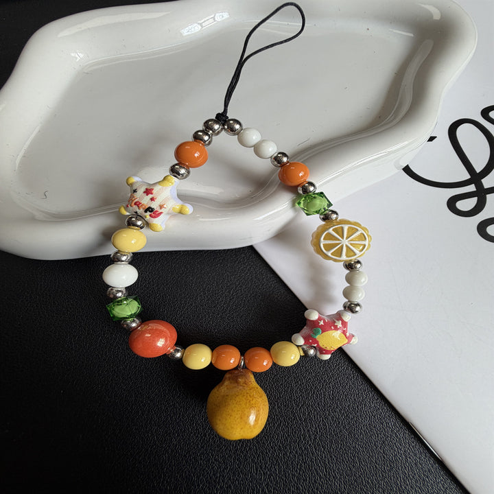 Playful Pearl and Charm Exaggerated Necklace Stornfield