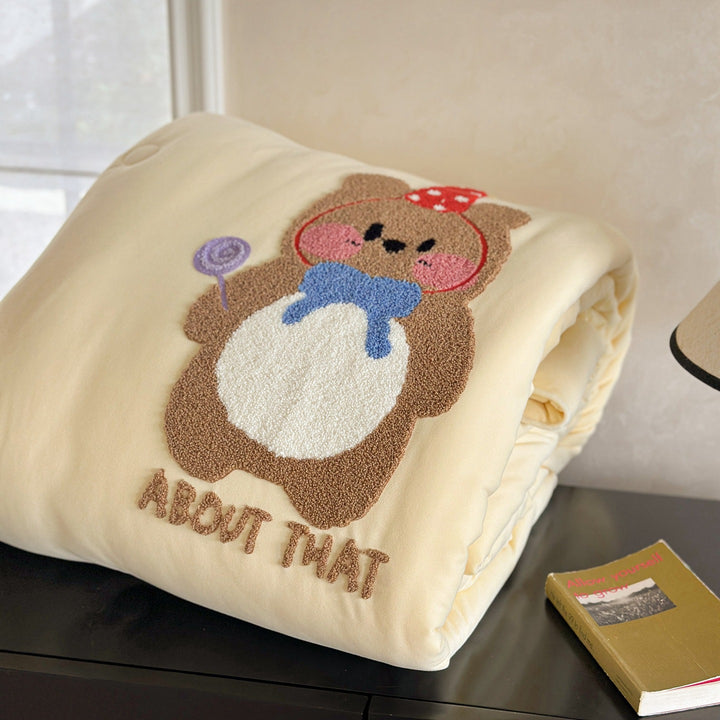 Children's bedding with tufted rabbit appliqué