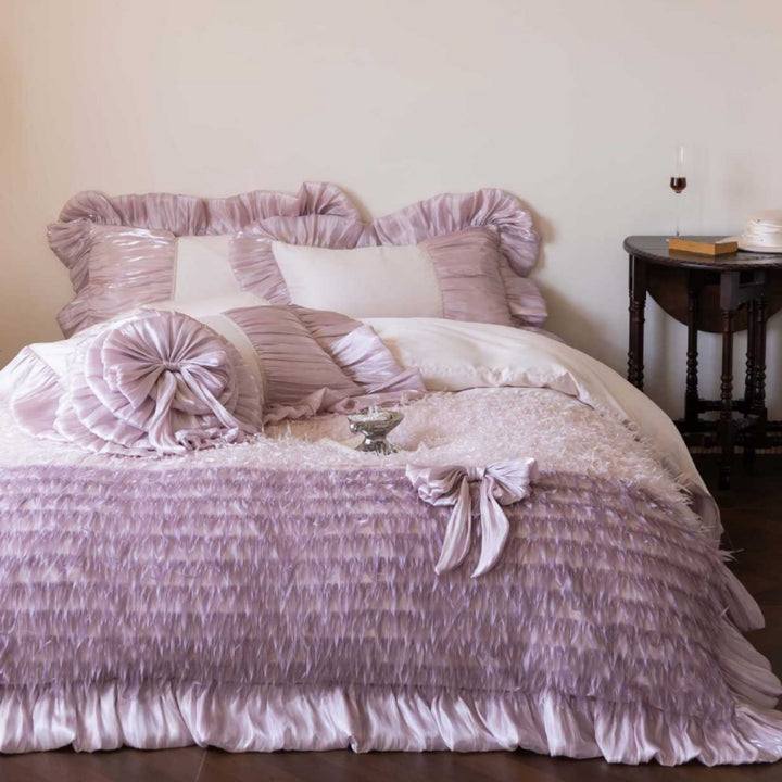 Luxurious ruffled satin bedspread and decorative pillow set with frill