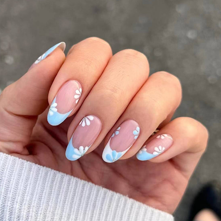 Creative French Nail Art with Flower Decorations Stornfield