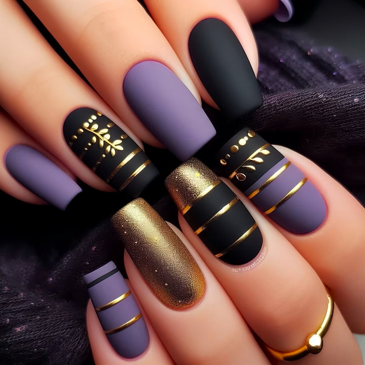 Trendy Press-On Nail Art with Decorative Gold Accents Stornfield