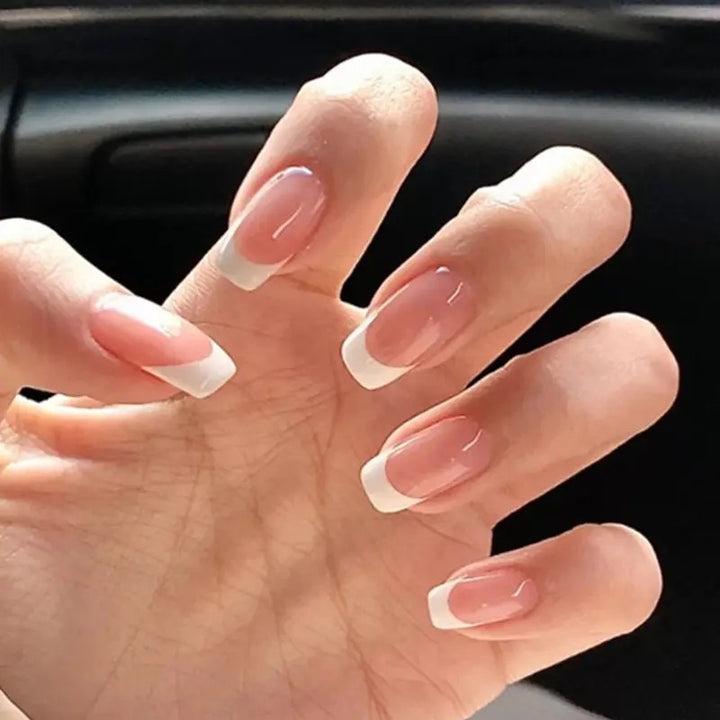 Acrylic nail set with elegant French design and glossy finish Stornfield