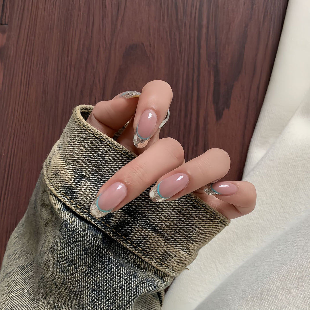 Artificial nails with shimmering glitter and elegant French-tip design Stornfield
