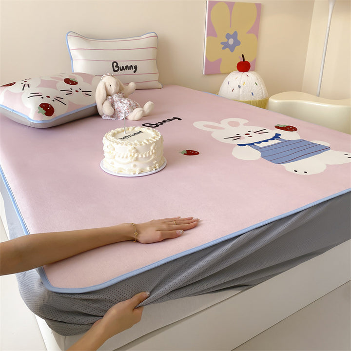Children's mattress topper and fitted sheet set with non-slip corner fasteners and cute dog design