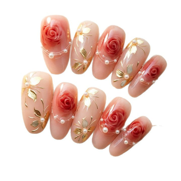 Artistic Nail Tips with Elegant Gold Jewelry Stornfield