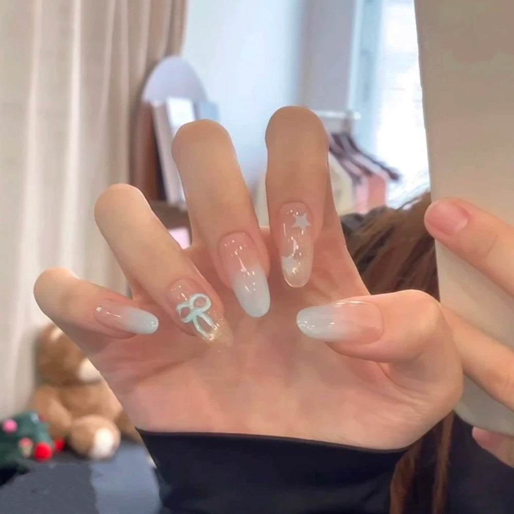 Artistic Press-On Nail Set with Glitter and Floral Accents Stornfield