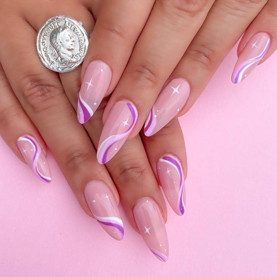 Elegant artistic nail extensions with delicate gradient and accented lines Stornfield