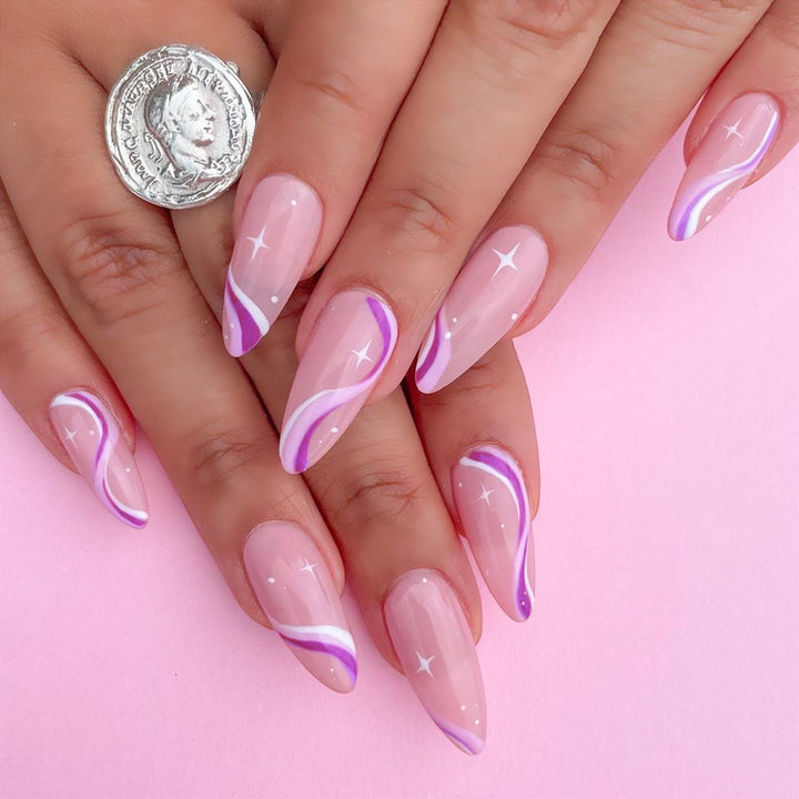 Elegant artistic nail extensions with delicate gradient and accented lines Stornfield