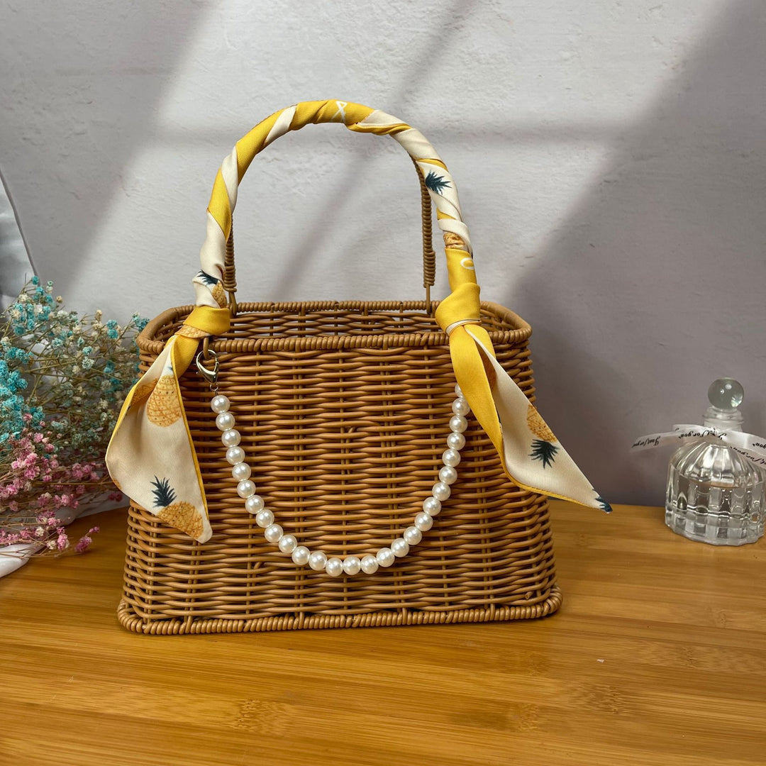 Women's stylish rattan container with pearl handle Stornfield