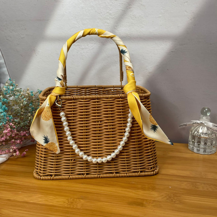 Women's stylish rattan container with pearl handle Stornfield