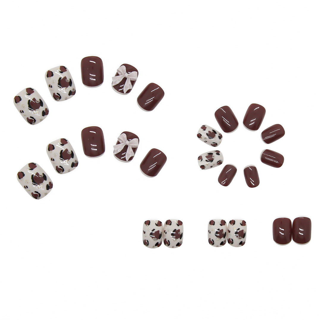 Artful nail tips with elegant foil decorations Stornfield