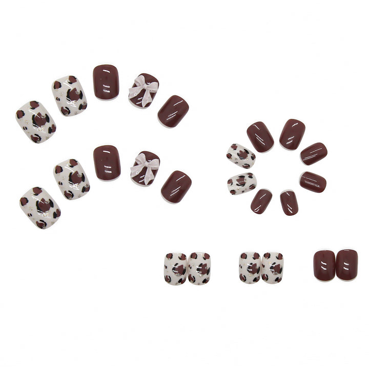 Artful nail tips with elegant foil decorations Stornfield
