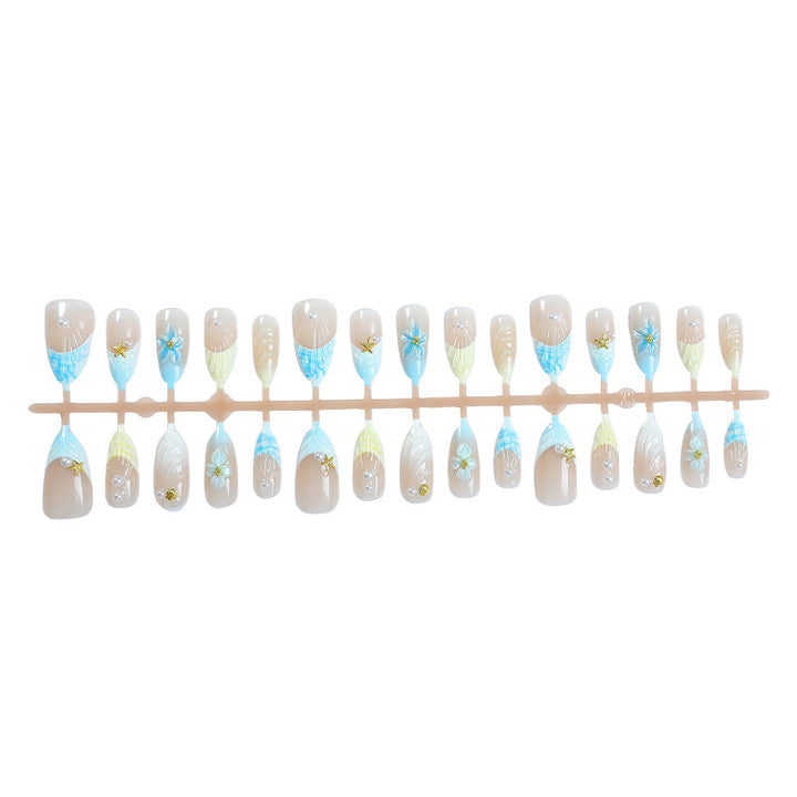 Artificial nail set with exquisite floral design and glitter accents Stornfield