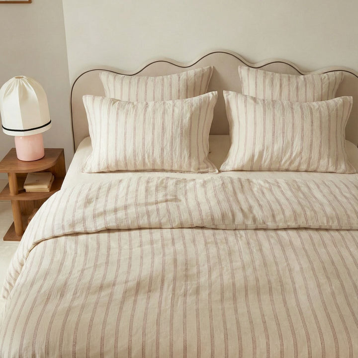 Linen bedding set with fine pinstripes and reversible function