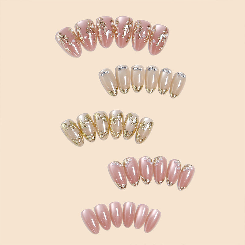 Artificial Nail Set with Elegant Gold Accent and Rhinestone Decorations Stornfield
