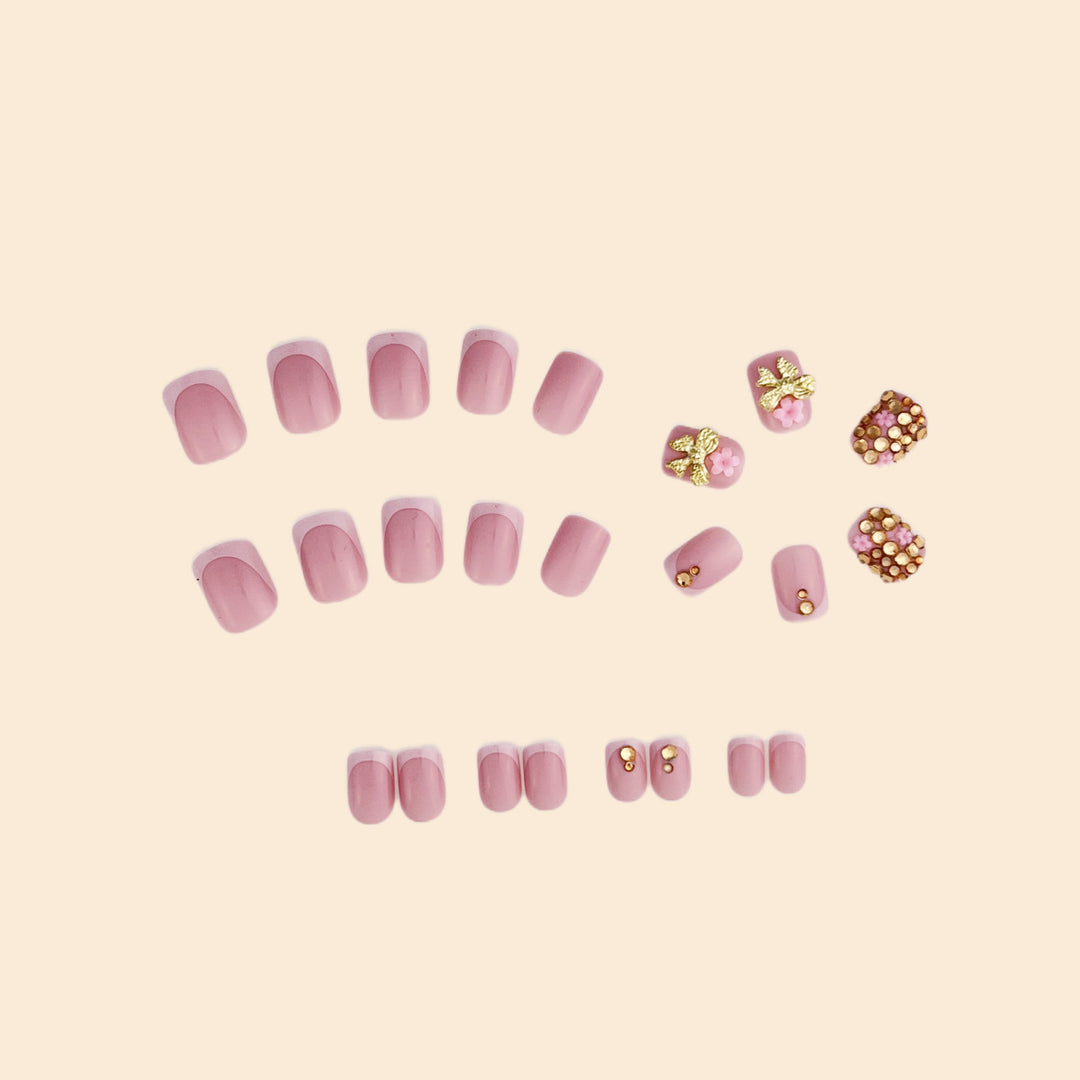 Glamorous Rhinestone and Floral Nail Art Stornfield