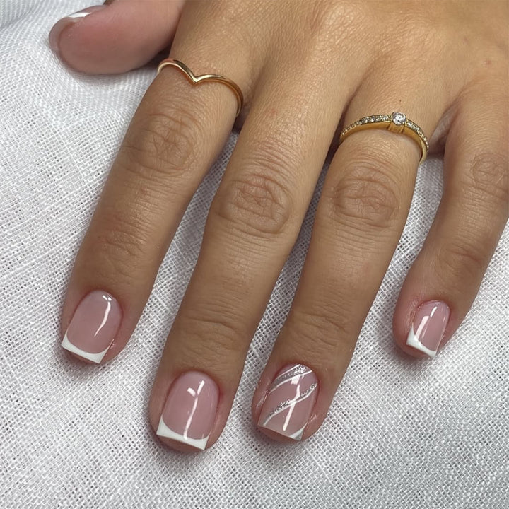 Elegant Nail Art with Glittering French Tip Stornfield