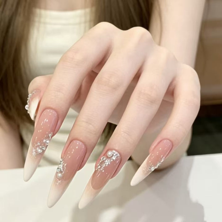 Elegant Stiletto Nail Extensions with Crystal Accents