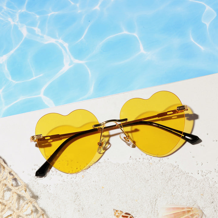 Ladies trendy heart sunglasses with mirrored lenses Stornfield