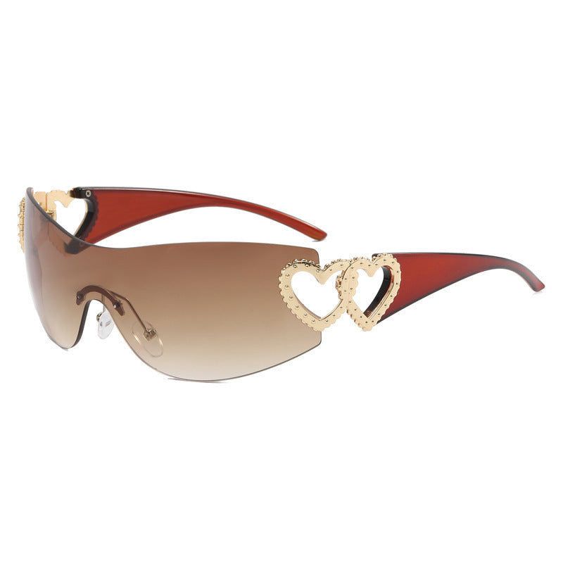 Ladies sporty sunglasses in trendy shield design with heart accents Stornfield