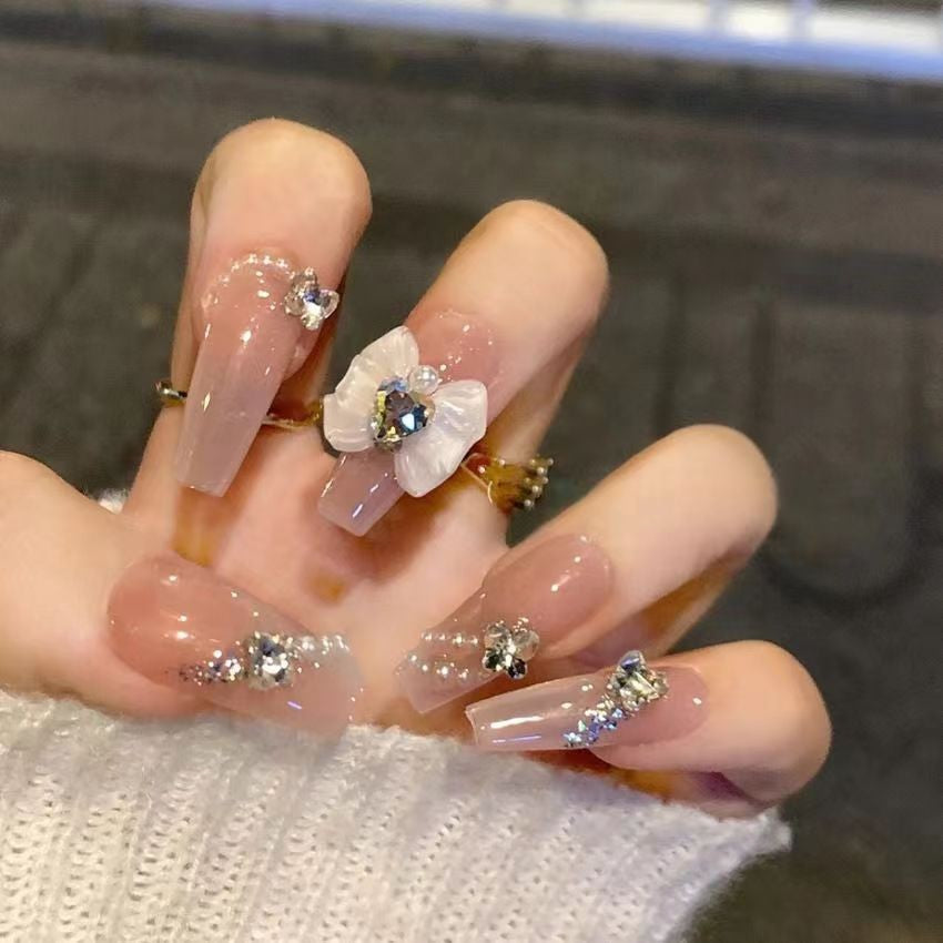 Glamorous artificial nails with moon and star motifs Stornfield