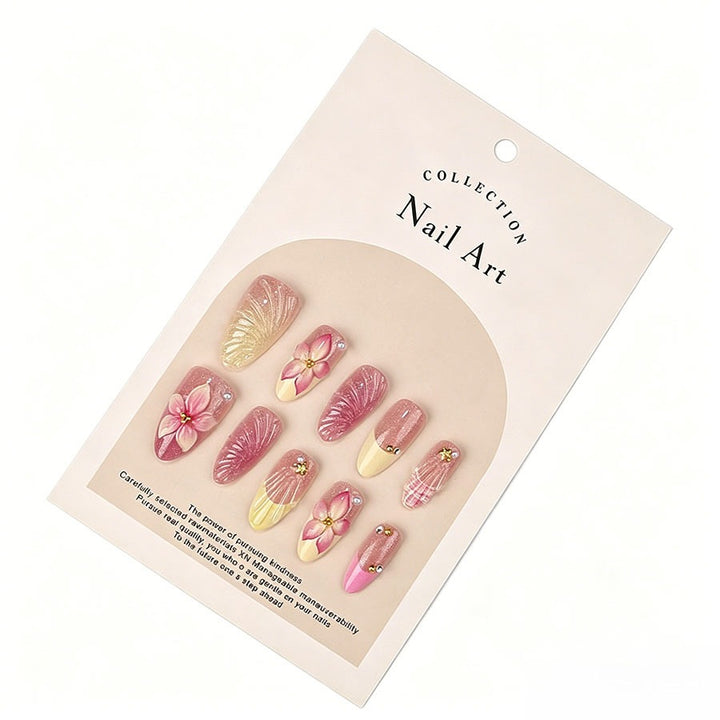 Artificial nail set with elaborate flower and shell patterns Stornfield