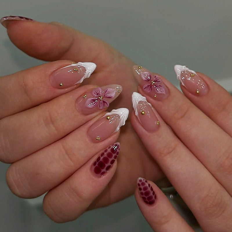 Artificial nail set with exciting flower and glitter designs Stornfield