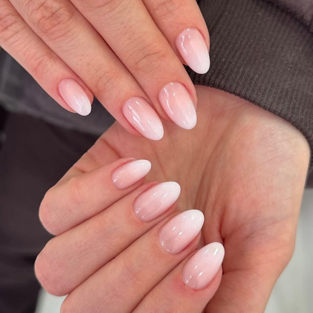 Artificial nail art with playful dots and bows Stornfield