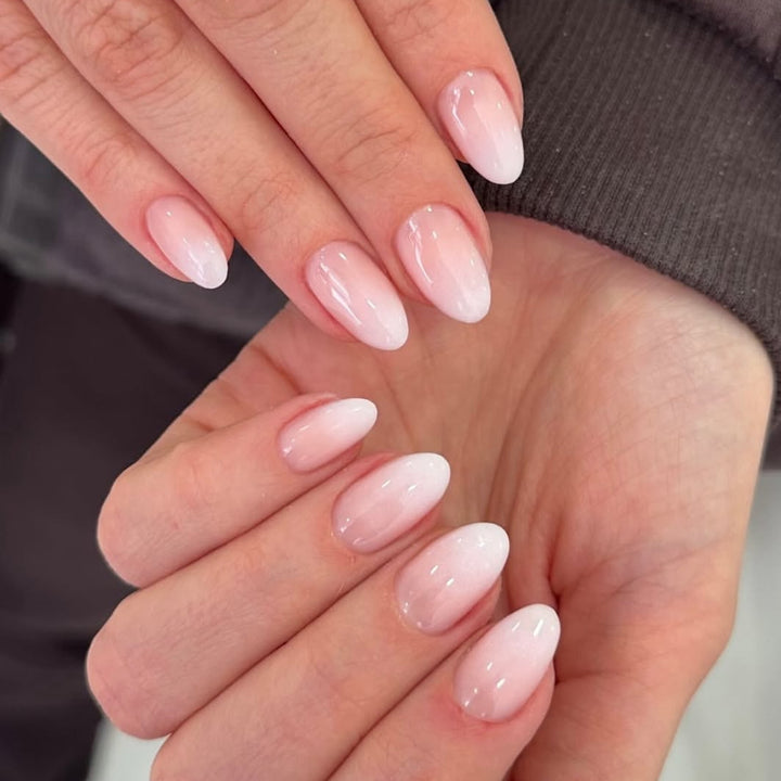 Artificial nail art with playful dots and bows Stornfield