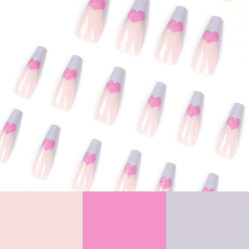 Artful stiletto nails with colorful heart designs Stornfield