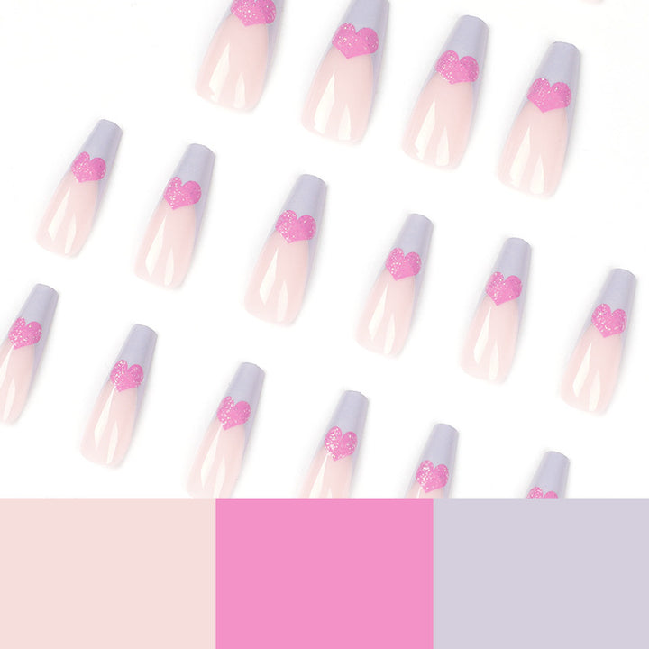 Artful stiletto nails with colorful heart designs Stornfield