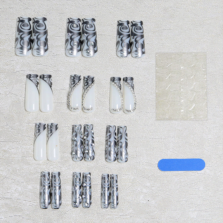 Elegant artificial nails with stylish embellishments Stornfield