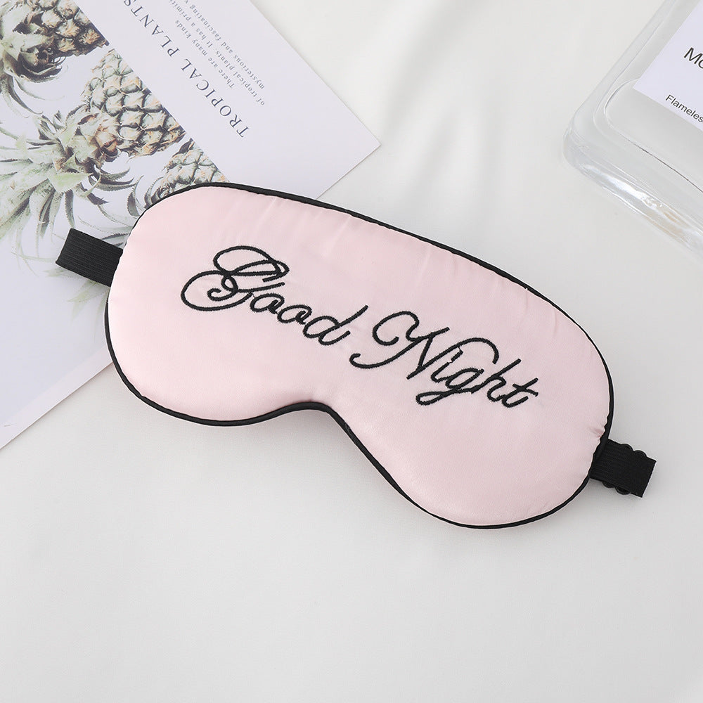Unisex embroidered contoured sleep mask with decorative text embroidery and adjustable elastic band Stornfield