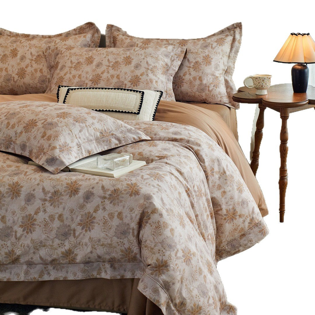 Luxurious cotton satin bed linen set with millefleurs floral pattern and fine piping