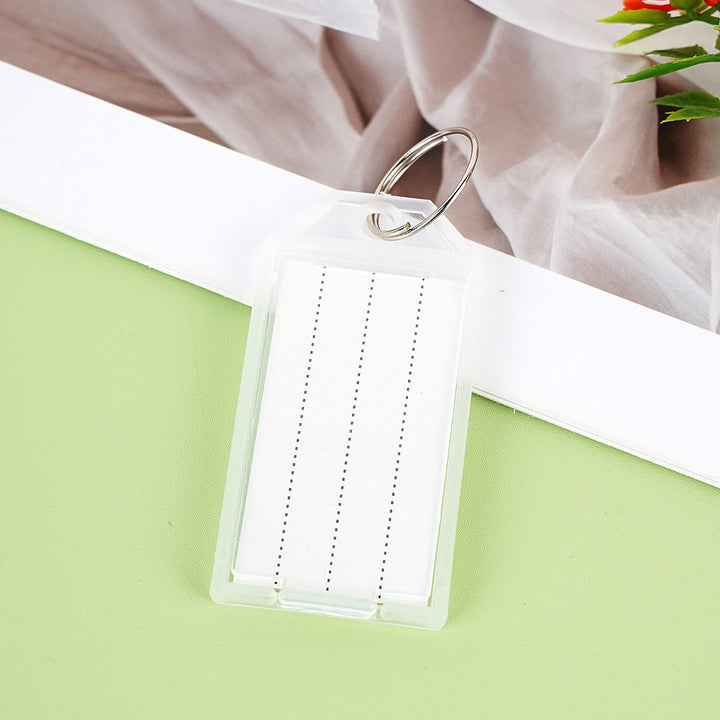 Unisex label tag with transparent sleeve and three writable fields Kalsten