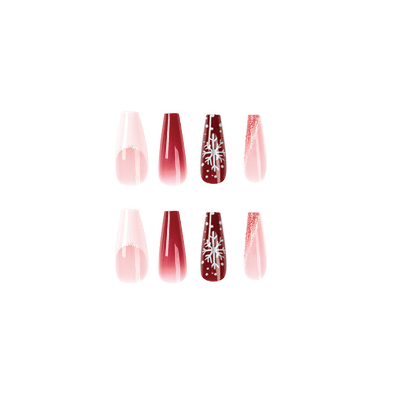 Artful Christmas nail extensions with elegant glitter and snowflake design Stornfield