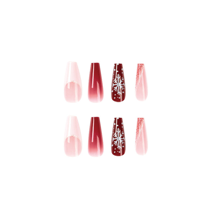 Artful Christmas nail extensions with elegant glitter and snowflake design Stornfield