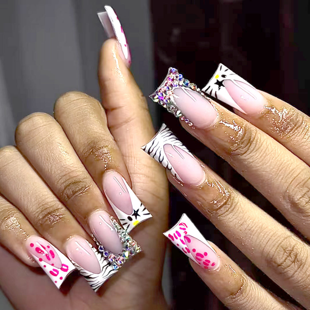 Decorative Stiletto Press-On Nails with Artistic Pattern and Gem Accents Stornfield