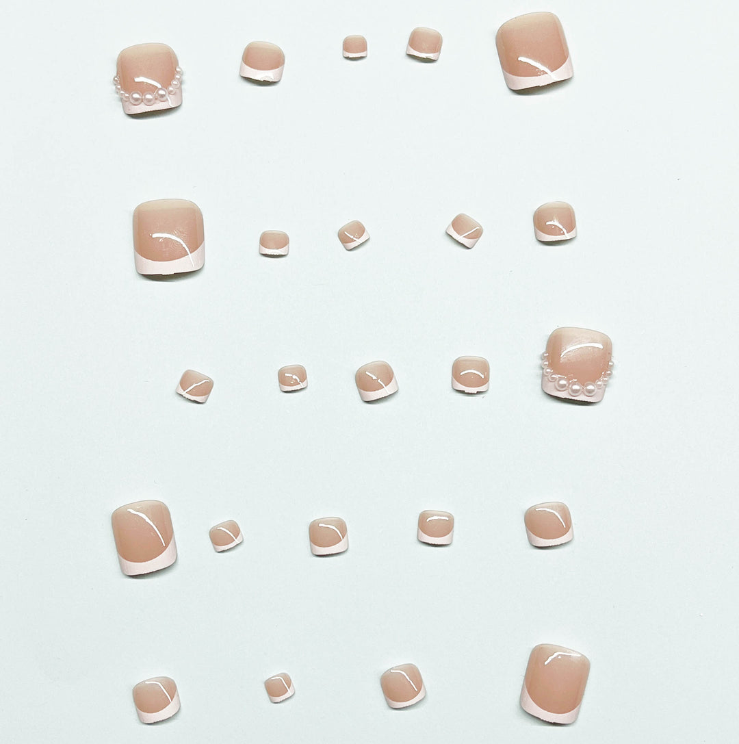 Artificial nail set for toenails with elegant tip decorations Stornfield