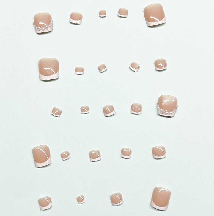 Artificial nail set for toenails with elegant tip decorations Stornfield