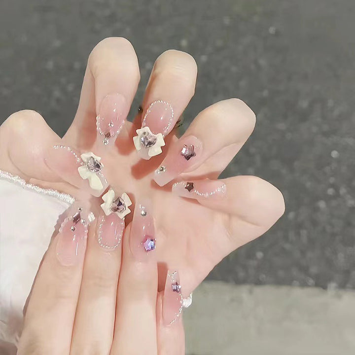 Artificial nails with floral accents Stornfield