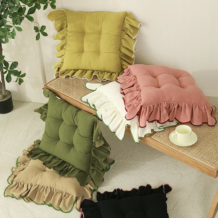 Padded chair cushion with ruffle and fastening bands