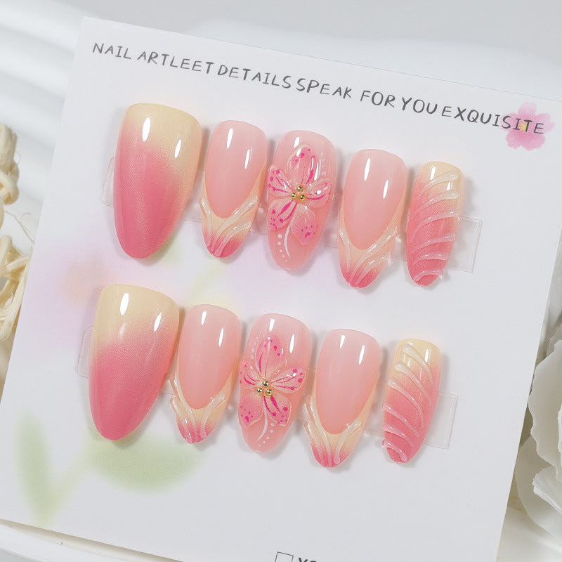 Artificial nail set with delicate floral designs and modern ombre effects Stornfield