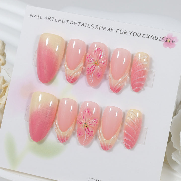 Artificial nail set with delicate floral designs and modern ombre effects Stornfield