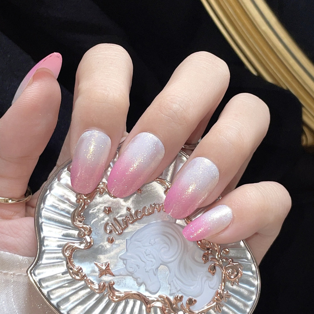 Artificial nails with glitter gradient and ombre effect Stornfield