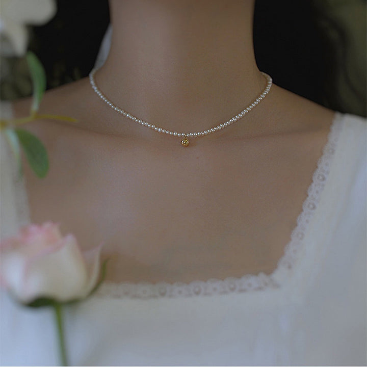 Delicate pearl necklace with elegant gold accent chain Stornfield