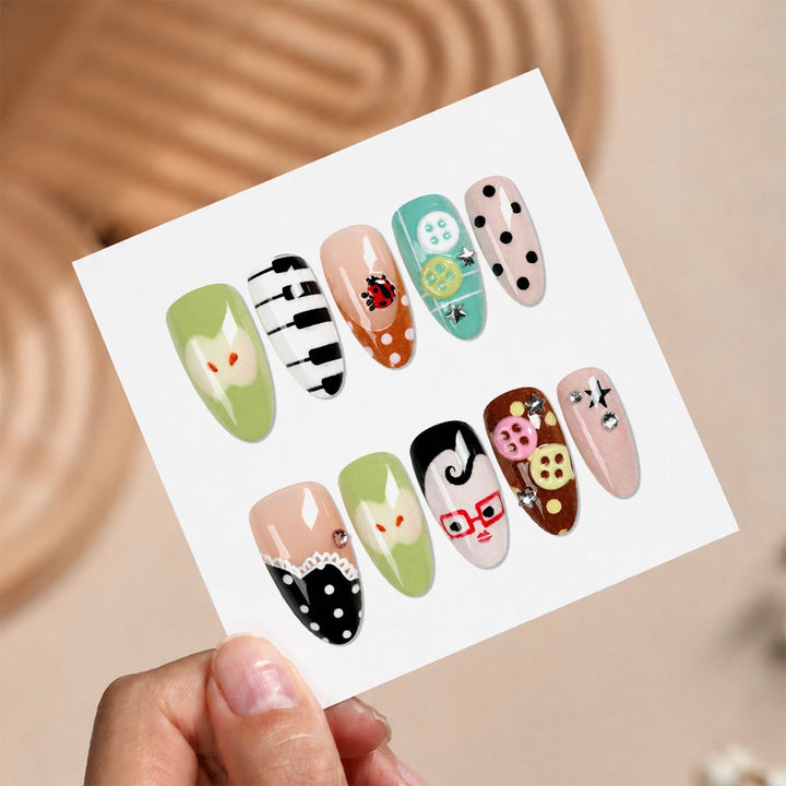 Creative nail art set with playful patterns and 3D details Stornfield