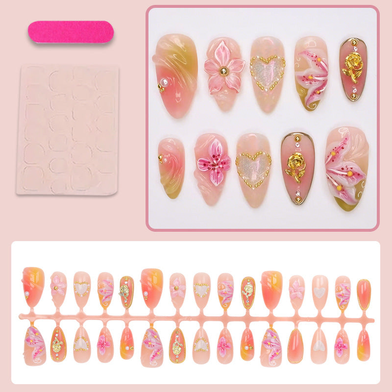 Artificial nail set with elegant floral decorations and glitter details Stornfield