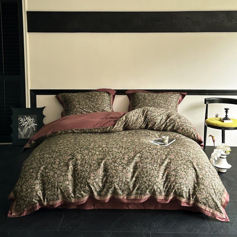 Reversible bedding set made of cotton satin with floral jacquard look and decorative hem